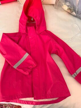 Reima girls hot pink rubber rain jacket in sizes 110 (5) and 122 (7)